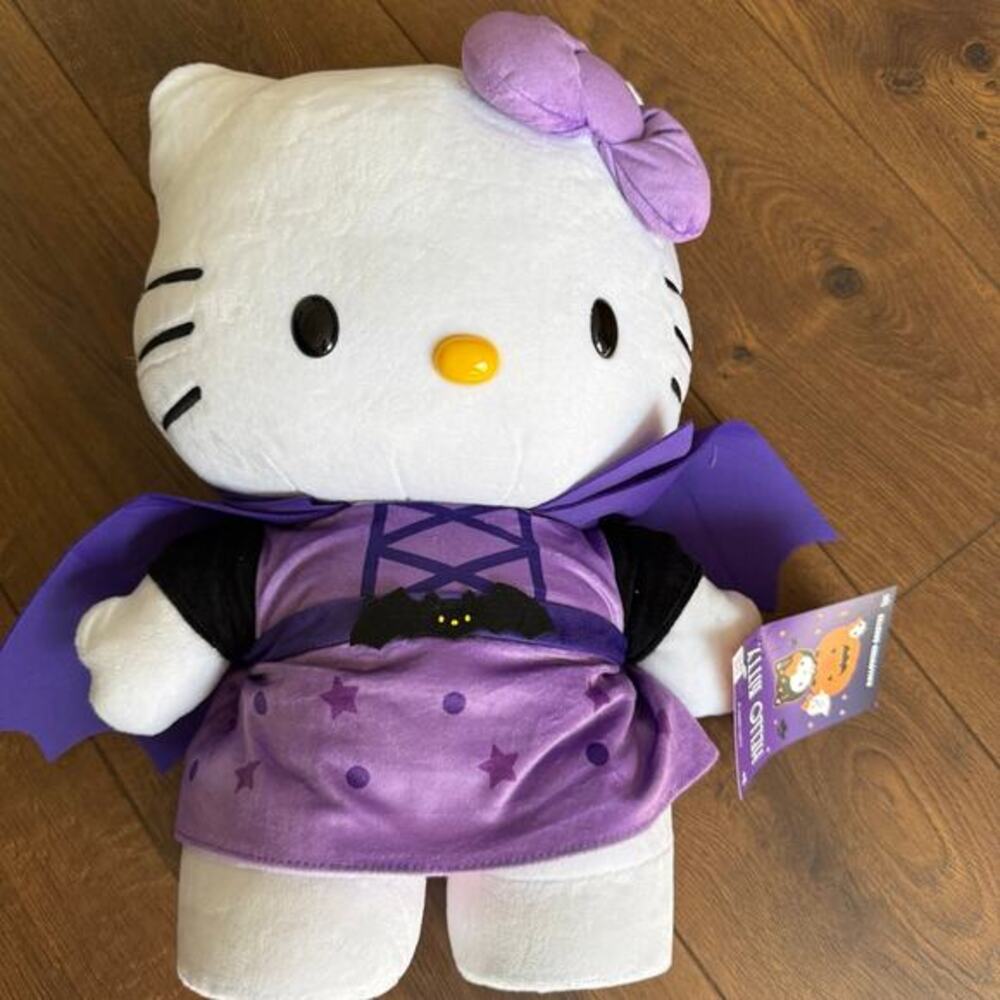 Hello‎ kitty CVS  Halloween purple vampire  greeter